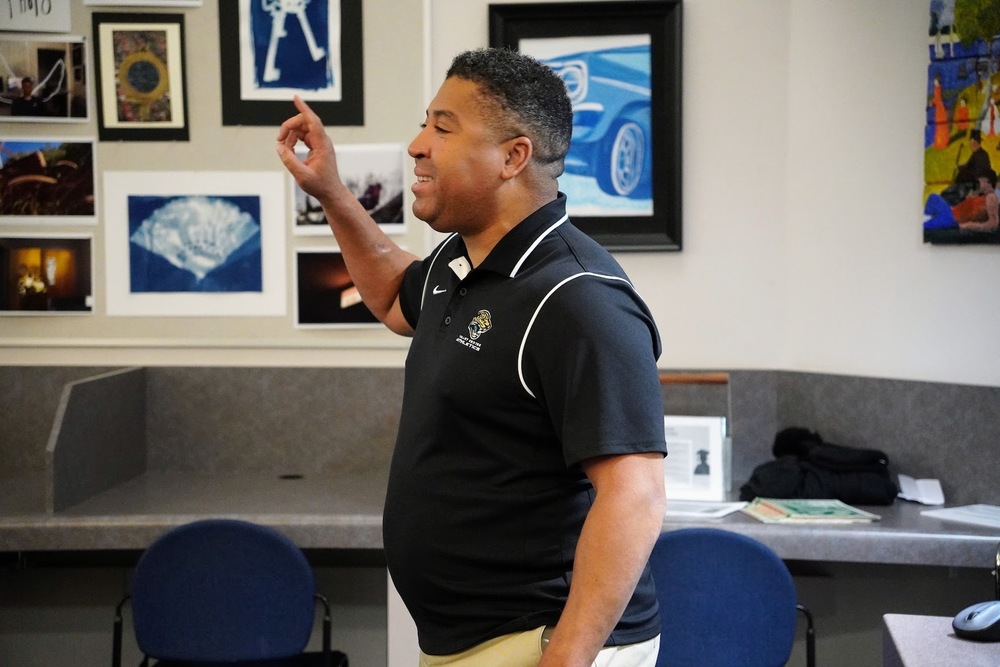 Valley Center High School Head Football Coach Sidaron Wilson addresses his players for the first time on Thursday, March 23.  